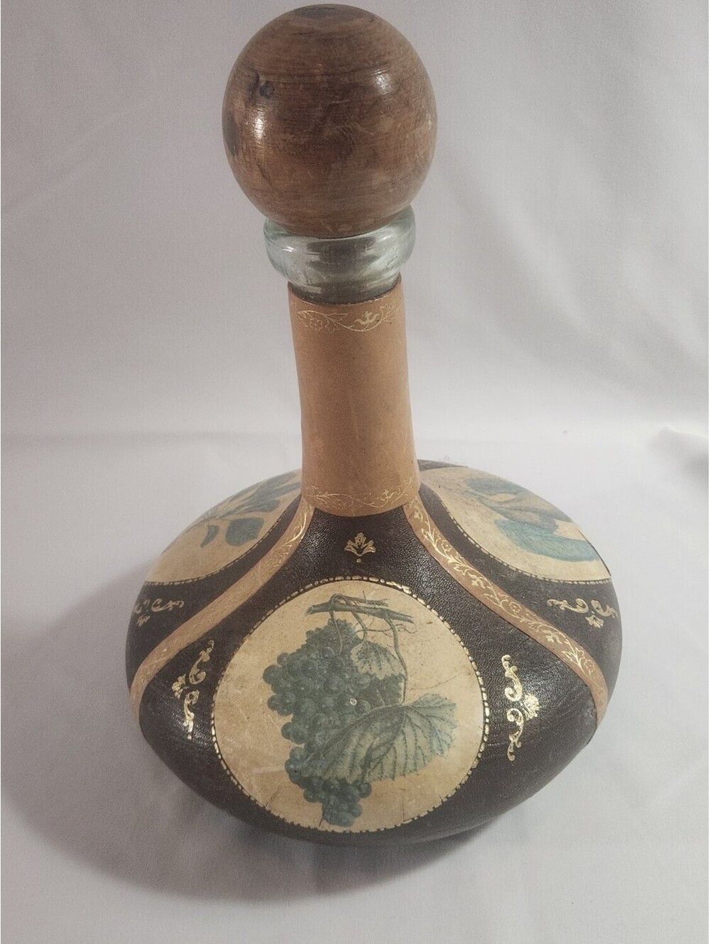 Fausto Corduri wrapped decanter bottle grapes, pears